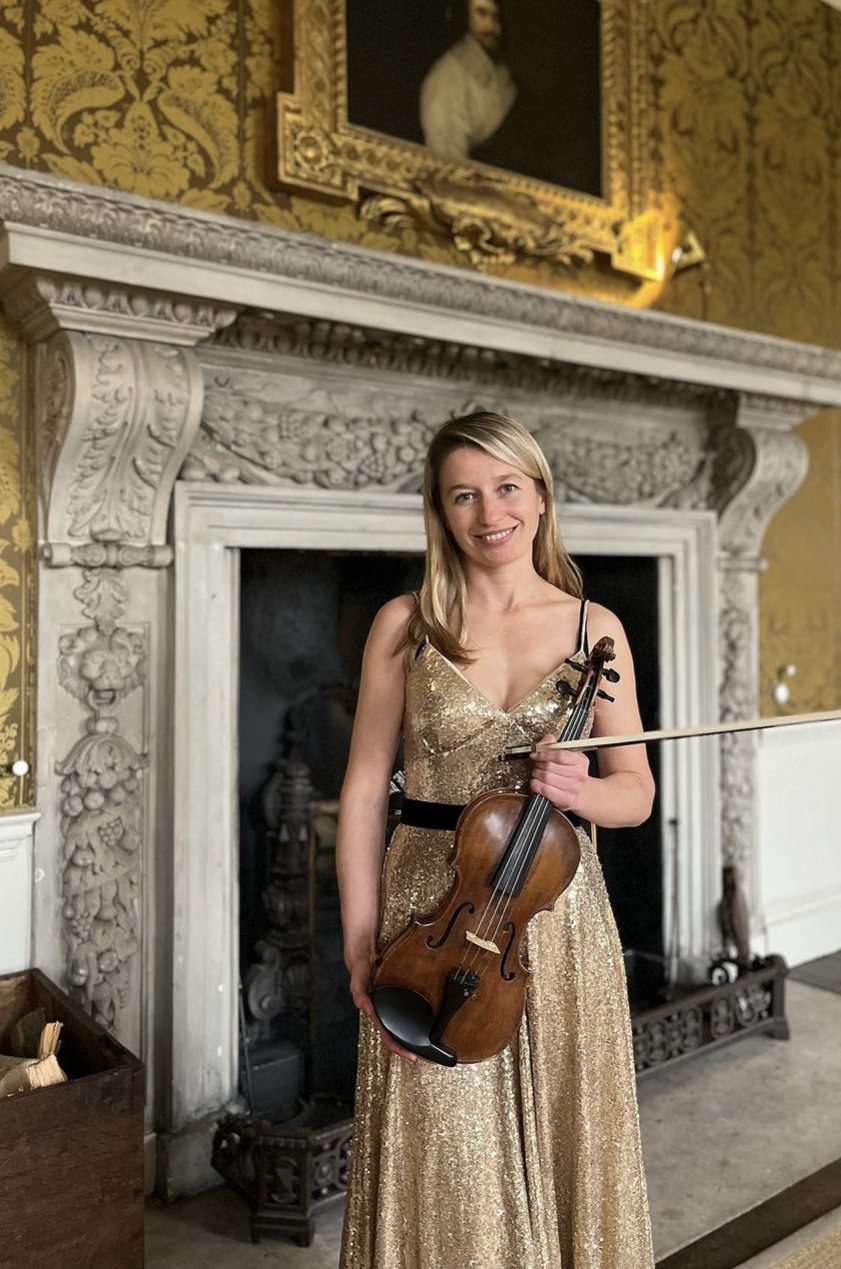 Anastasia holding her violin